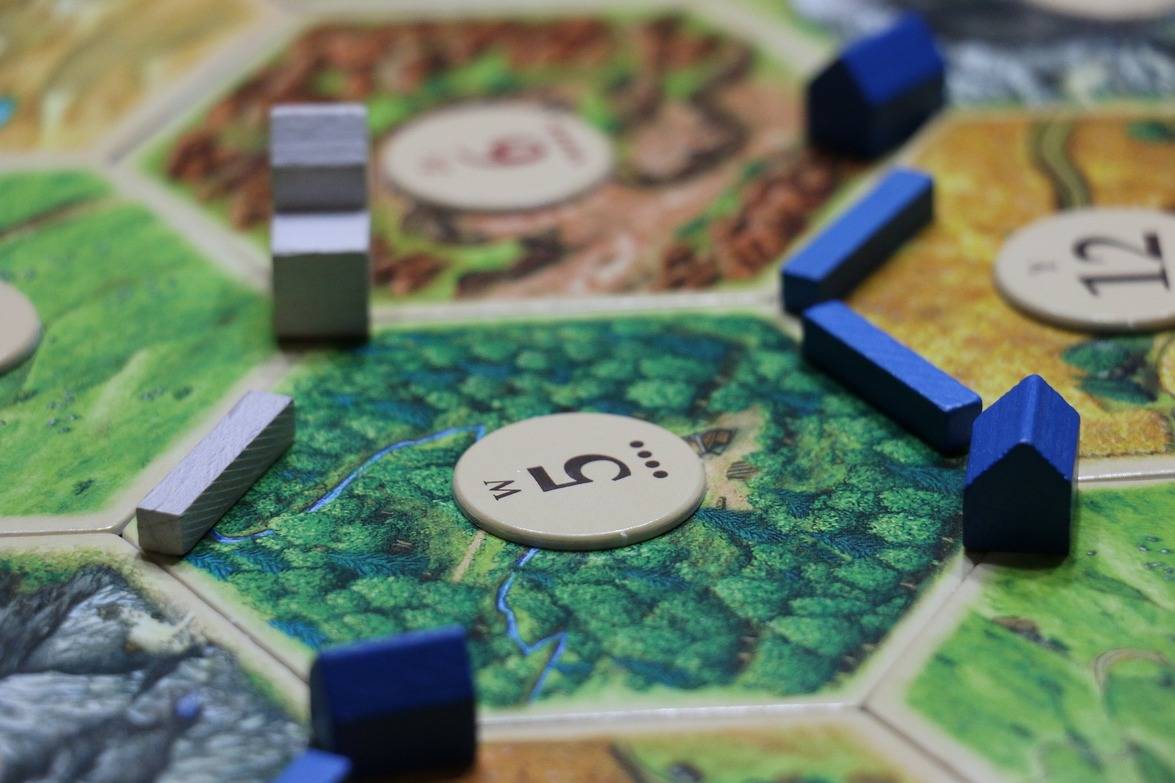 
          The Economics of Settlers of Catan
  